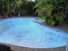 Old rendered and painted pool